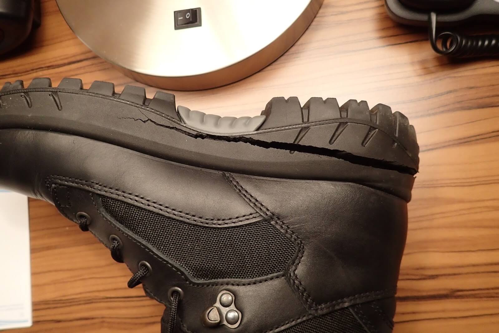 boot with hydrolysis on a wooden background 