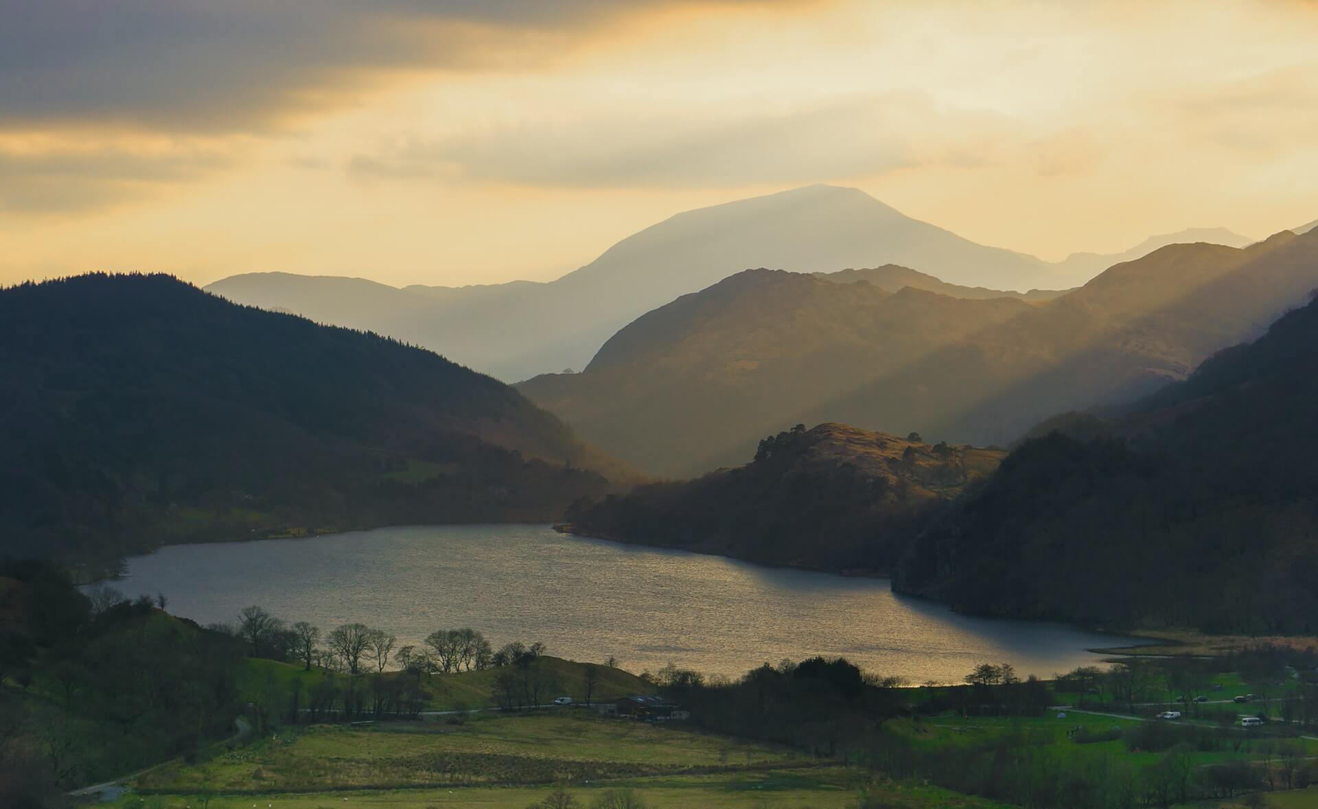  light rays coming through onto Llyn Gwynant, Snowdonia